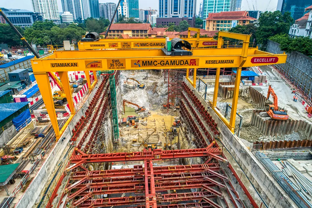 Ongoing excavation works and reinforced concrete works at the Conlay MRT Station site.