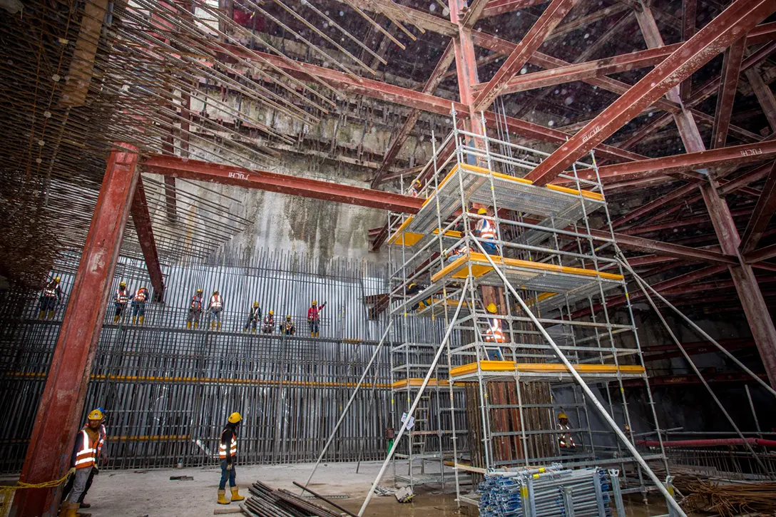 View of the columns and perimeter wall construction at Conlay MRT Station Entrance B.