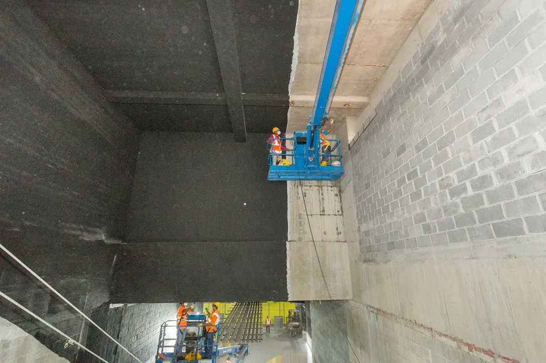 View of the Conlay MRT Station showing the painting of soffit and wall at the Entrance B.