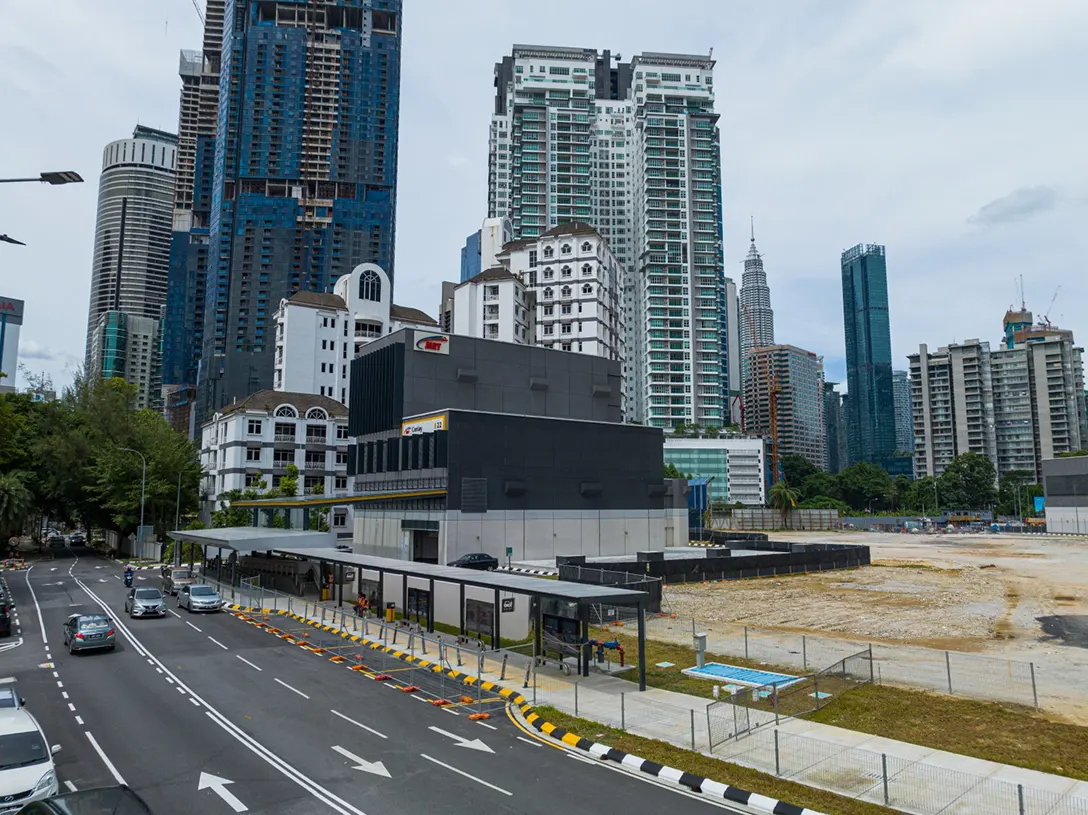 Aerial view of the Conlay MRT Station showing the Entrance B and covered walkway along Jalan Conlay.