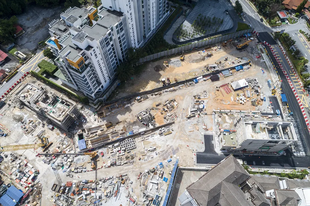 Aerial view of the Conlay MRT Station showing the Entrances A and B building structures in progress.