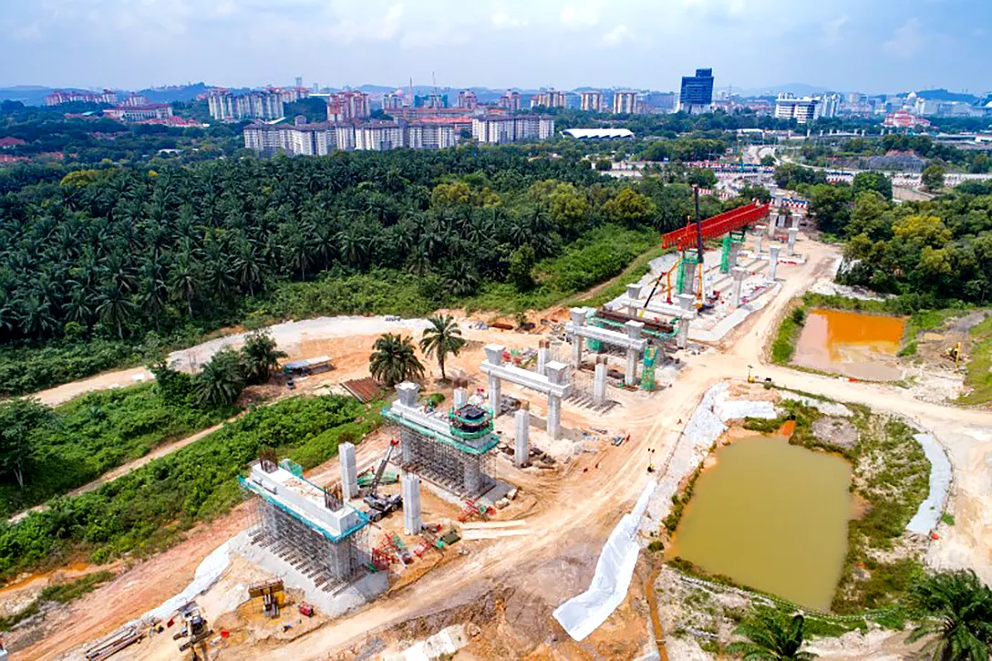Aerial view of cross beam and pier head construction at the Cyberjaya City Centre MRT Station site.