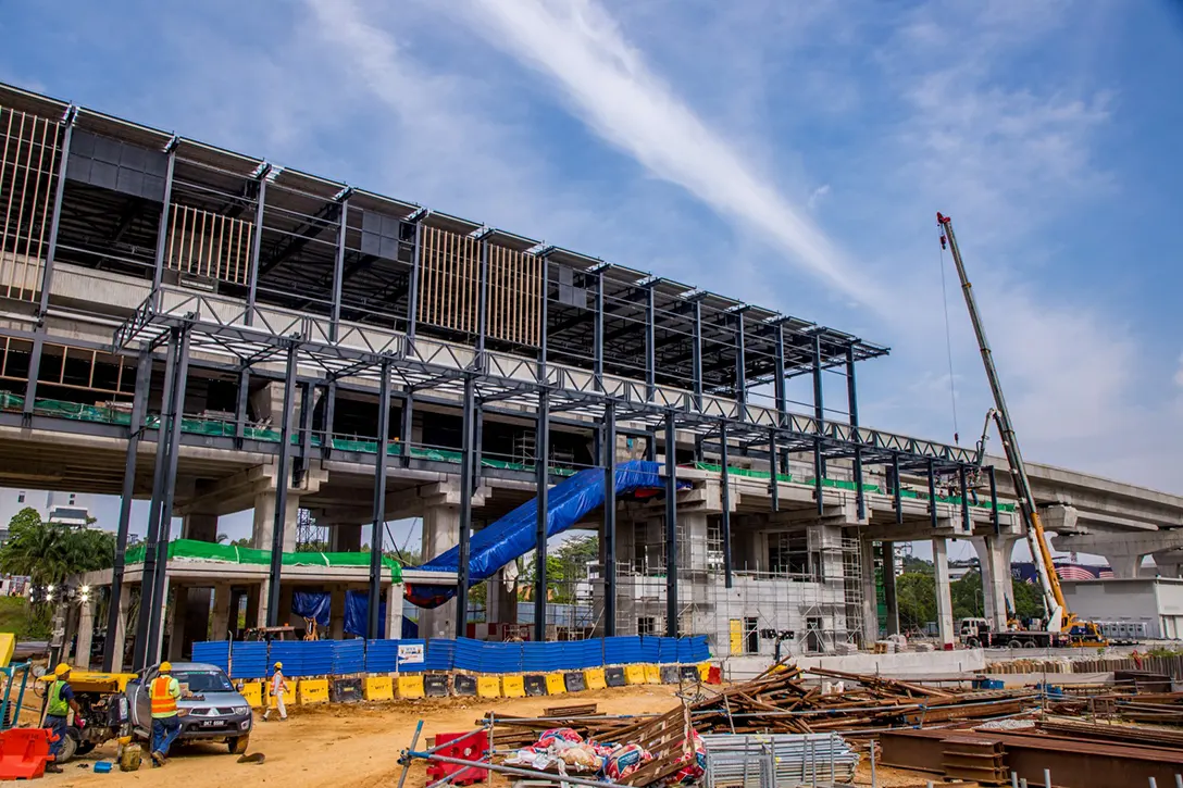 Entrance steel structure in progress and escalators at entrance installed at the Cyberjaya City Centre MRT Station site.