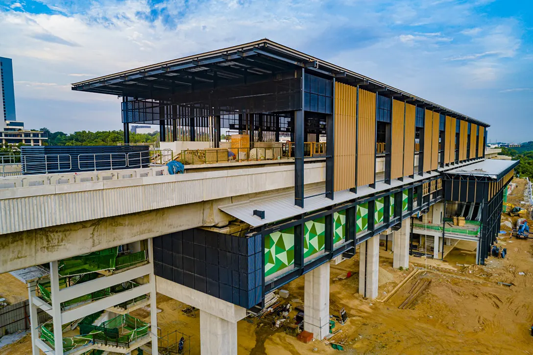 Aerial view of the Cyberjaya City Centre MRT Station showing ongoing roof aluminium composite panel installation works.