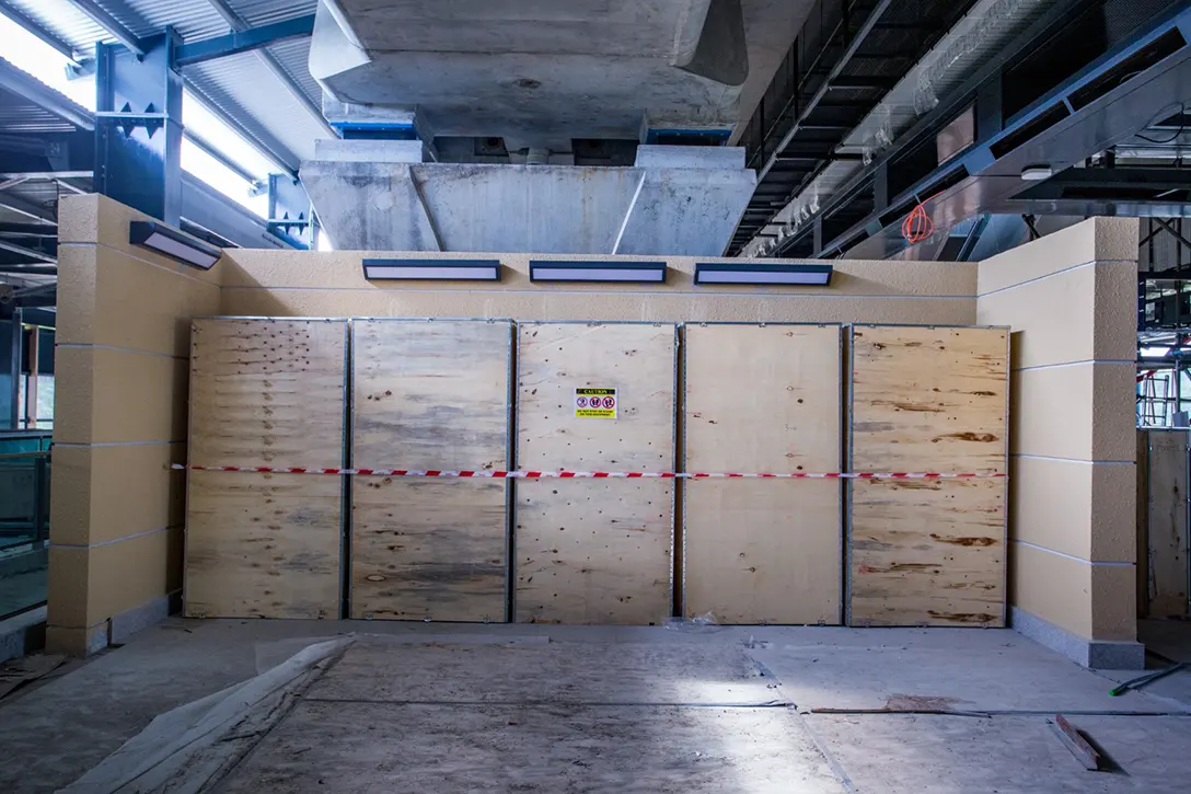 View inside the Cyberjaya City Centre MRT Station showing the ticket vending machine installation in progress.