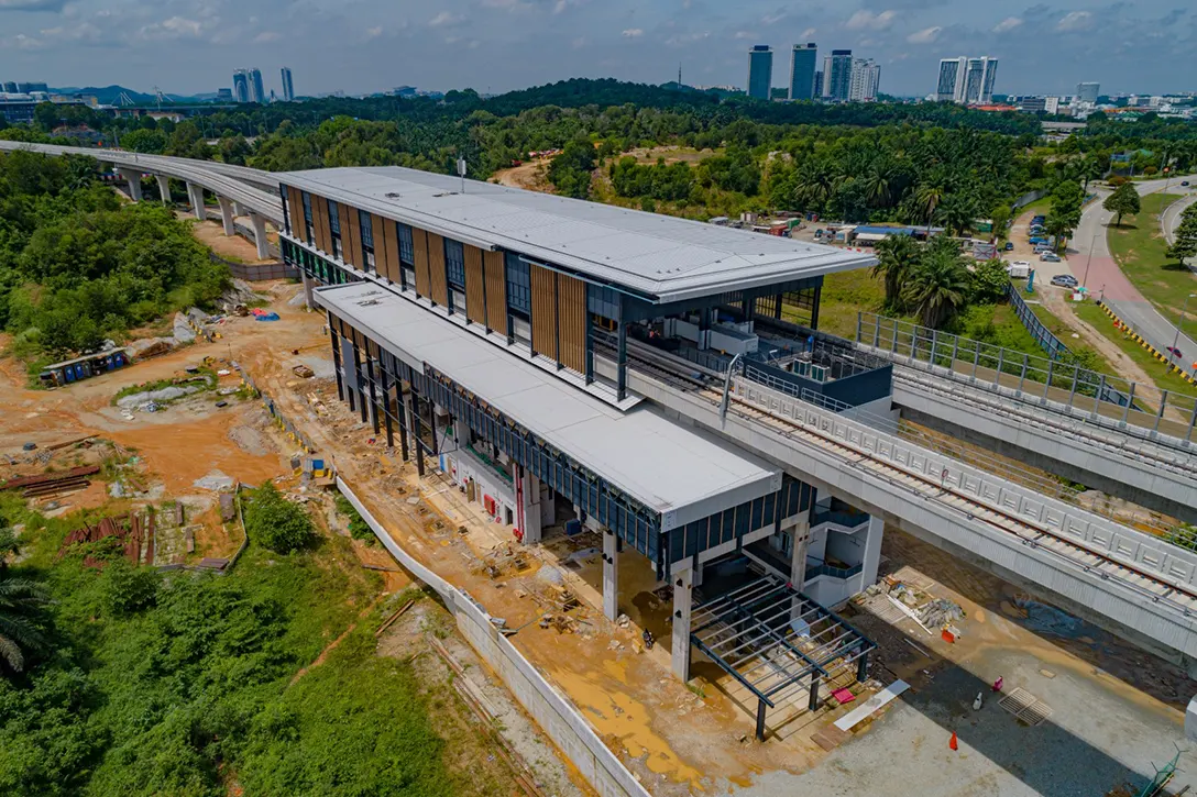 Aerial view of the Cyberjaya City Centre MRT Station showing the aluminium composite panel roof installation works in progress.