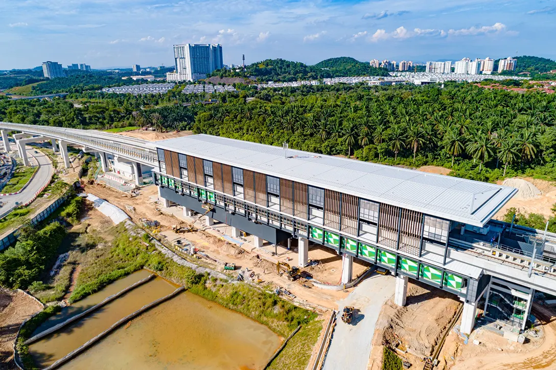 Aerial view of the Cyberjaya City Centre MRT Station showing the external works such as road, drainage, walkway and other works in progress.