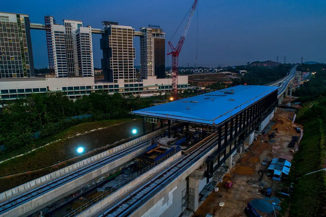 Aerial view of the first layer installation of the Cyberjaya Utara MRT Station roof cover in progress.
