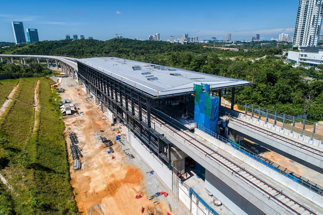 Aerial view of the Cyberjaya Utara MRT Station site showing the formwork and rebar for public staircase works in progress.