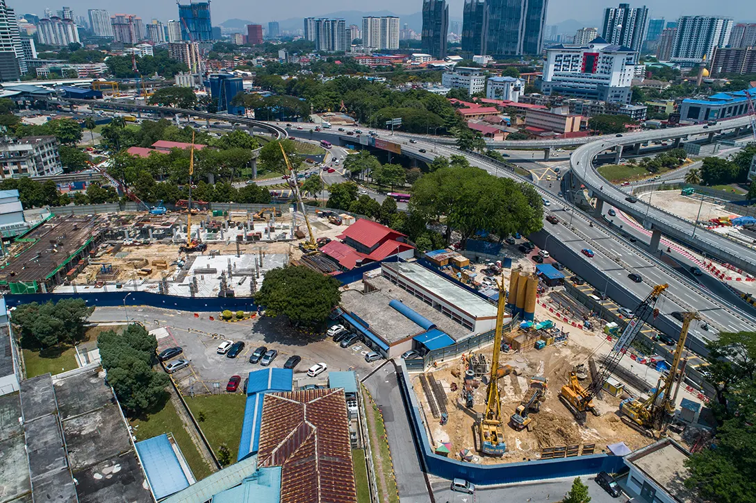 Aerial view of the Hospital Kuala Lumpur MRT Station site showing the ongoing construction of secant piles walls.