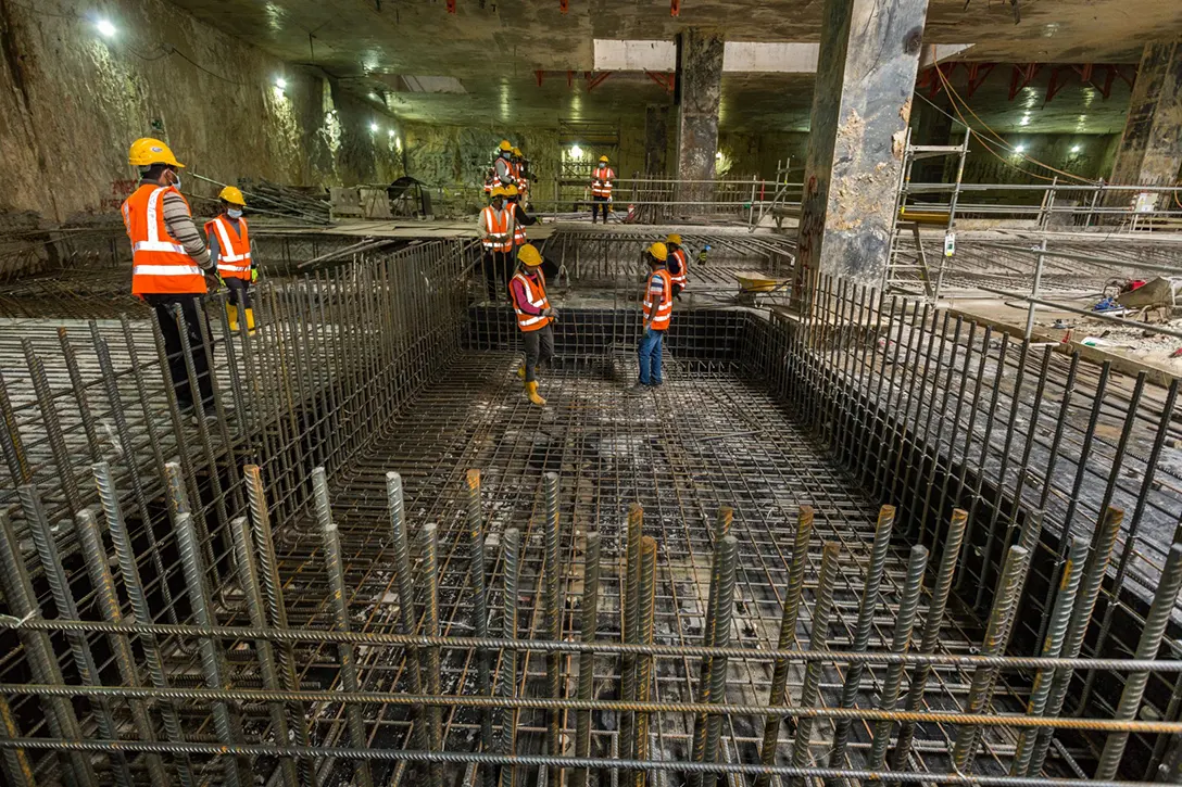 Reinforced concrete rebar works and ongoing cleaning for plantroom slab at the Hospital Kuala Lumpur MRT Station site.