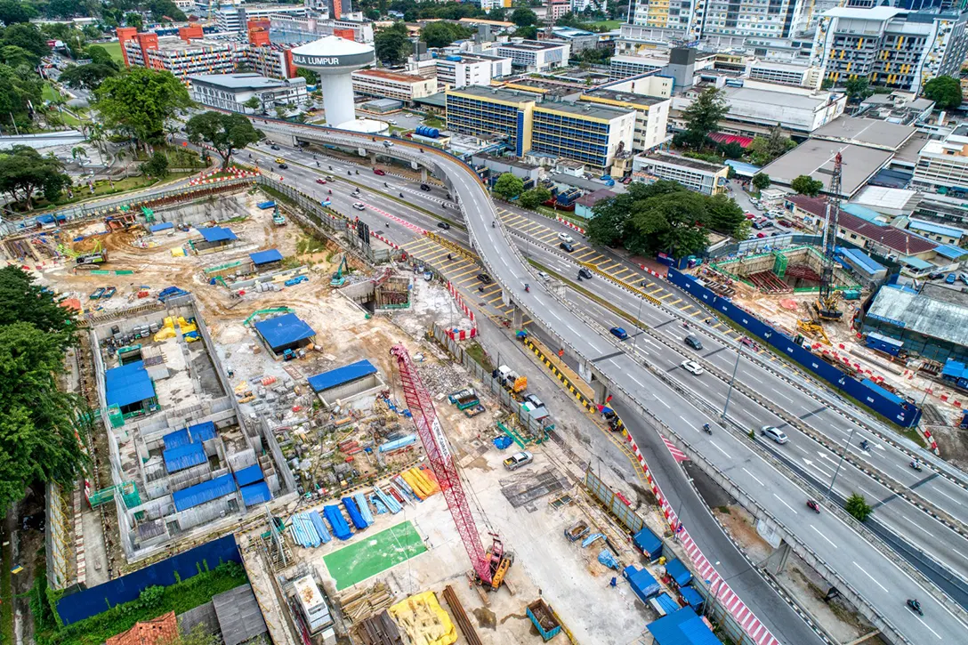 Aerial view of the Hospital Kuala Lumpur MRT Station showing the civil and structural, architectural builders works and finishes and mechanical, electrical and plumbing in progress from platform level to concourse level Entrance B ground slab construction.