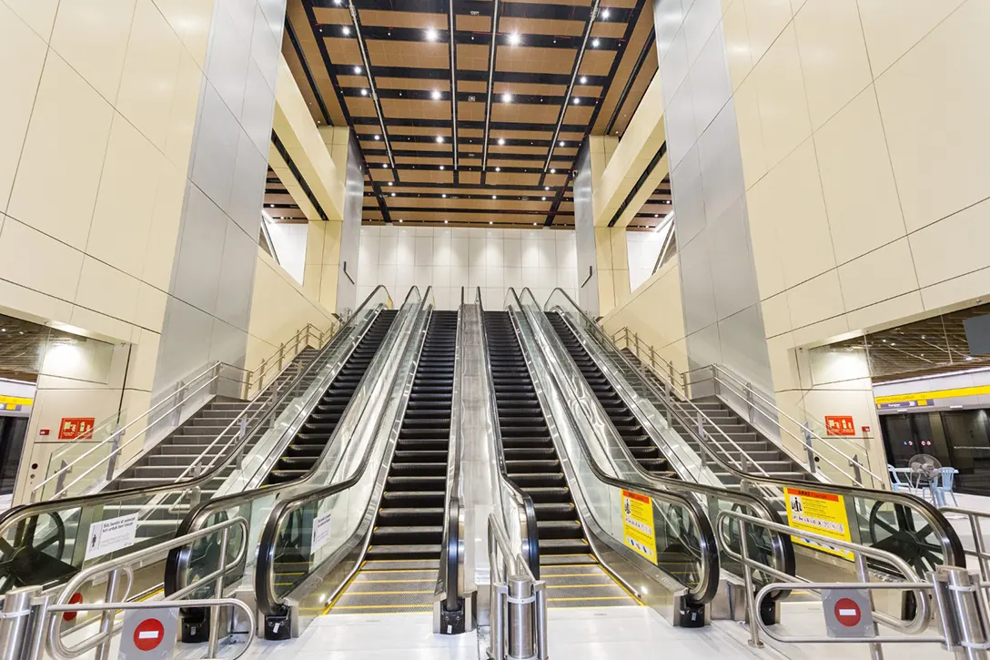 View of the completed reinforced concrete structure, architecture finishes and escalator installation from plantroom level to platform level of the Hospital Kuala Lumpur MRT Station.