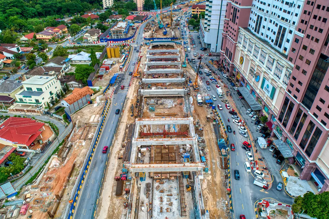 Aerial view of the Jalan Ipoh MRT Station site showing the excavation works, strutting and base slab construction in progress.