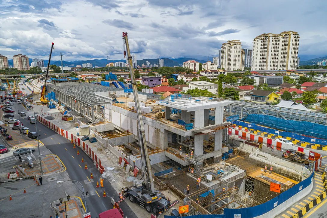 Aerial view of the Jalan Ipoh MRT Station site showing the steel structure and roofing works in progress.