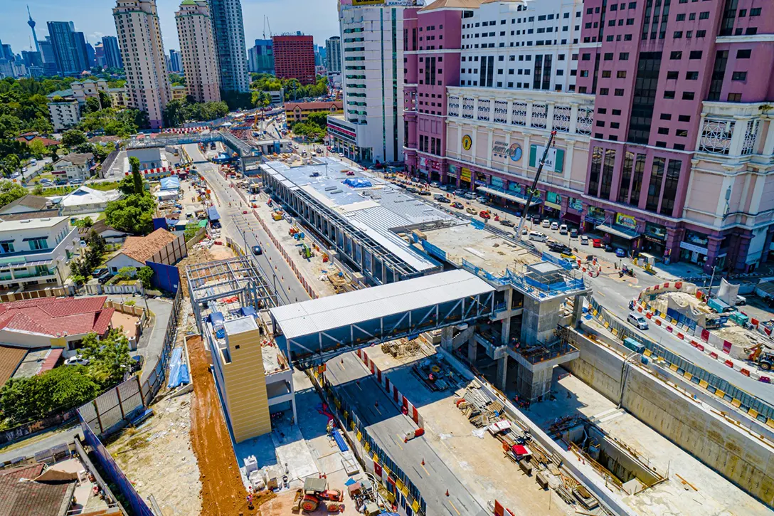 Aerial view of the Jalan Ipoh MRT Station showing the link bridge that has been launched and concreted as well as roofing works in progress.