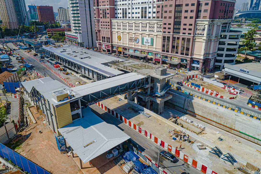 Aerial view of Jalan Ipoh MRT Station showing the roofing sheet installation works in progress.