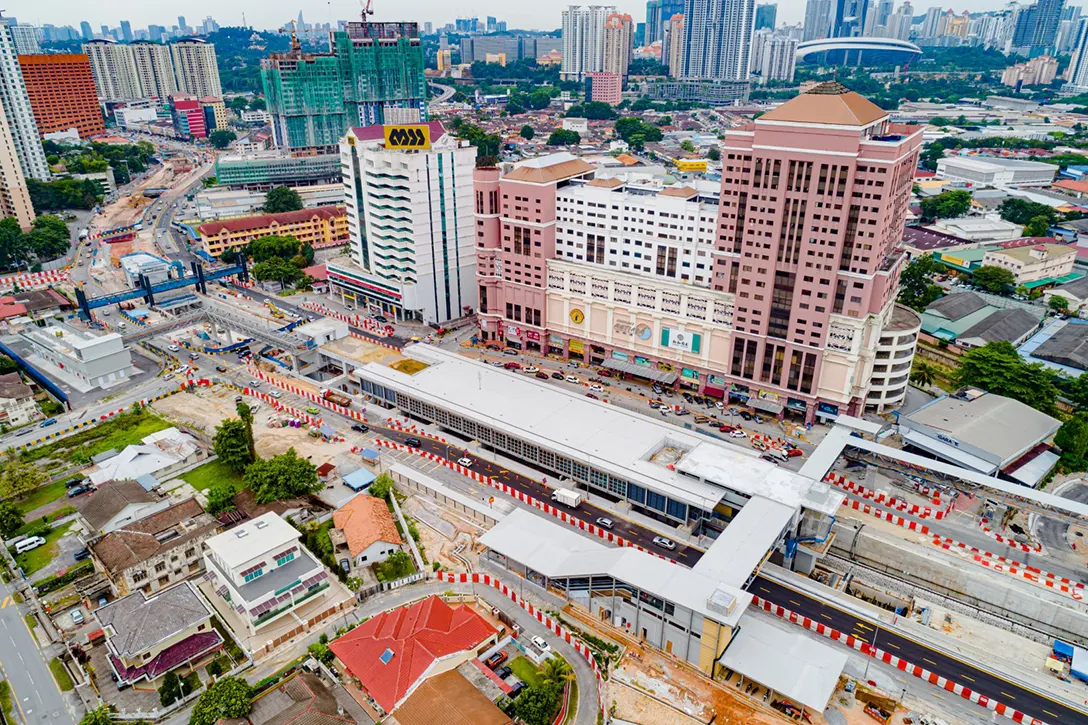 Aerial view of the Jalan Ipoh MRT Station showing the tiling works in progress at the edge of the platform.