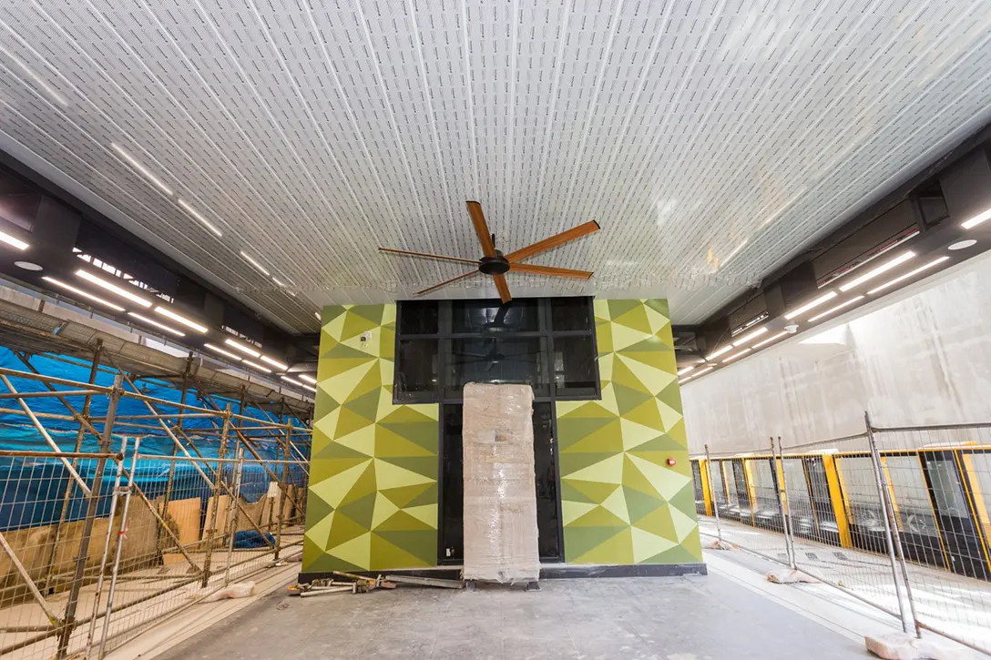 View inside the Jalan Ipoh MRT Station showing the mural painting works on lift in progress