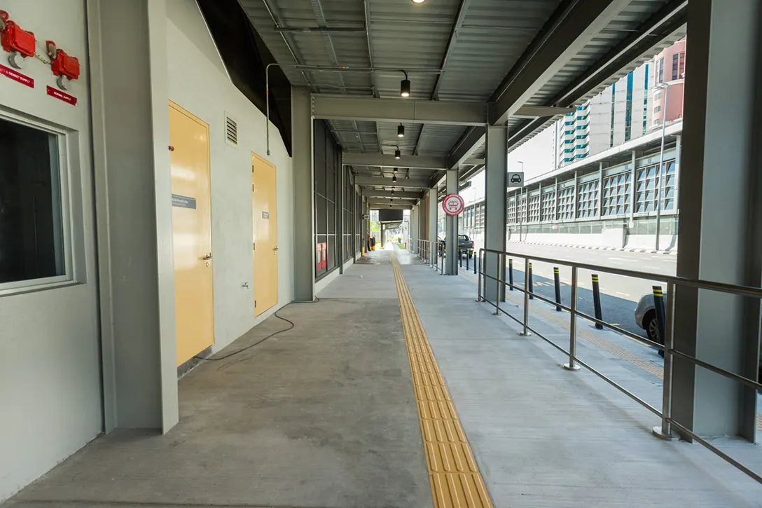 Covered walkway and drop off/pick up passengers area for bus and taxi completed at the Jalan Ipoh MRT Station.