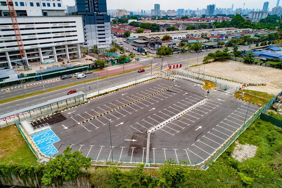 Aerial view of the at-grade park and ride Jinjang MRT Station showing the rectification works for defects list in progress