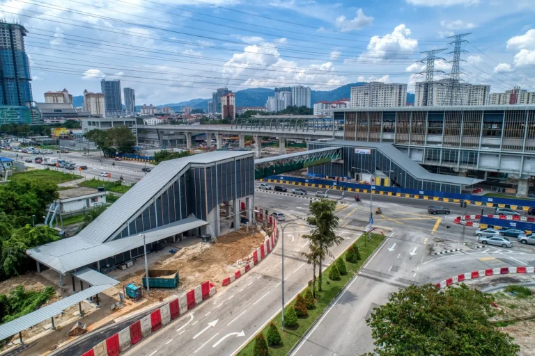 Aerial view of the Pedestrian Overhead Bridge Jinjang MRT Station showing the walkway and apron slab works in progress at Entrance 2
