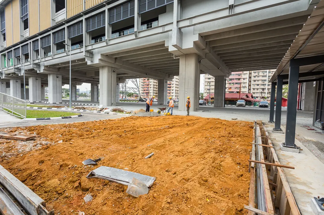 View of the Kampung Batu MRT Station touch-up paint and turfing works in progress