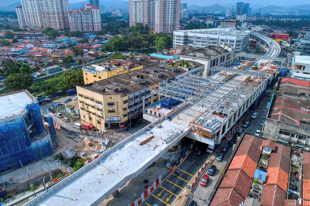 Aerial view of the Kentonmen MRT Station site showing the steel structure works in progress.
