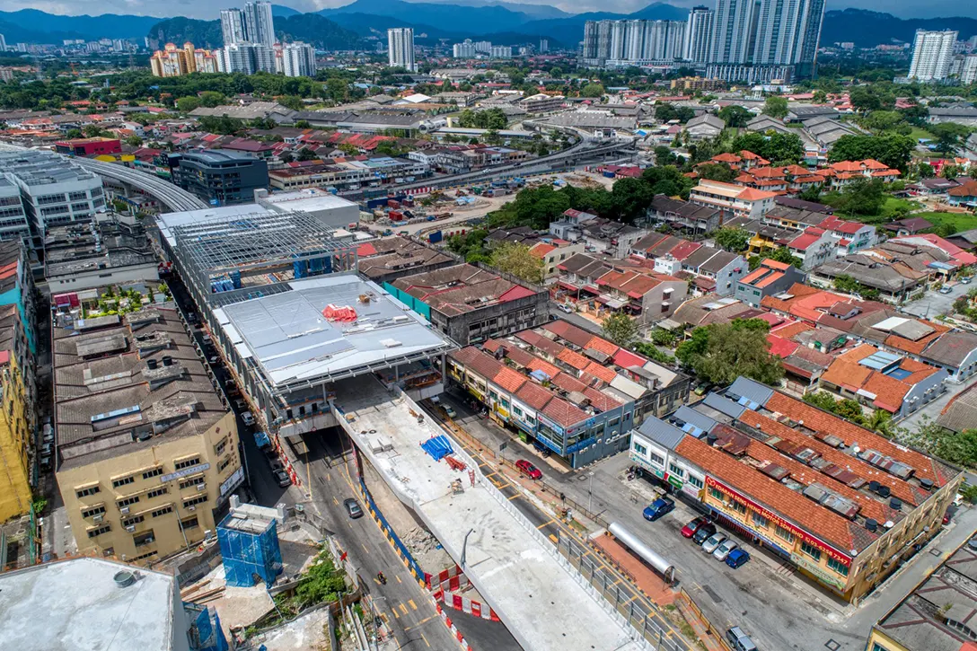 Aerial view of the Kentonmen MRT Station site showing the roofing works in progress.