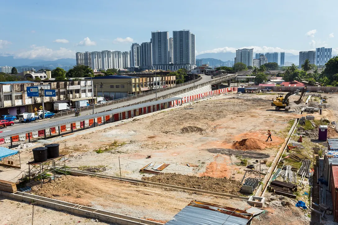 The trimming sub-grade level works in progress at the Kentonmen MRT Station At Grade Park and Ride