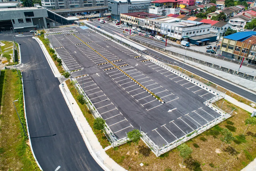 Aerial view of the Kentonmen MRT Station at-grade park and ride showing the permanent road marking works in progress.