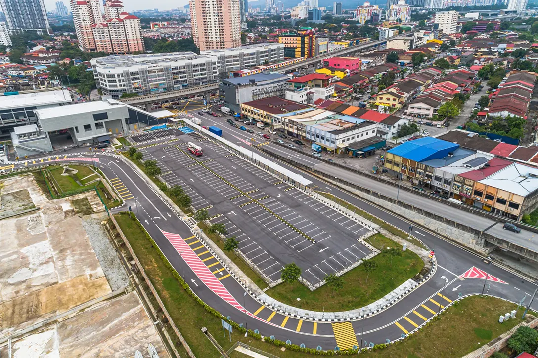 Overview of at grade park and ride of the Kentonmen MRT Station.