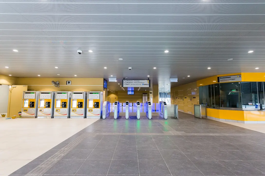 Testing and commissioning of Automatic Fare Collection gate system in progress at the Kentonmen MRT Station.