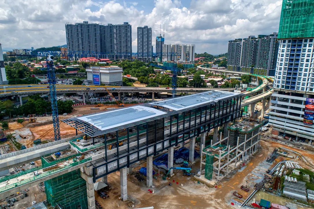 Aerial view of the Kuchai MRT Station site showing the ongoing installation of steel structure works, façade and construction of entrance box A.