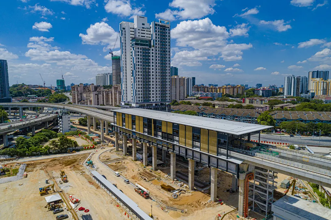 Aerial view of the Kuchai MRT Station showing the covered walkway and road works in progress.