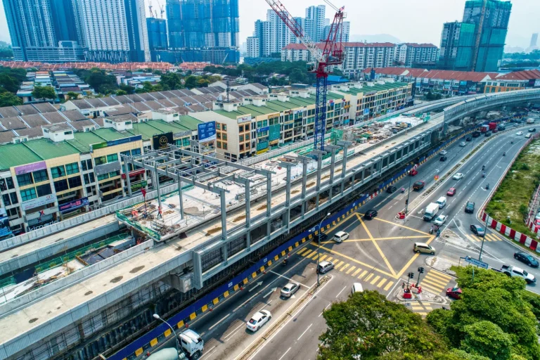 Aerial view of the installation works for steel structure upper frame in progress at the Metro Prima MRT Station. Completed works for beam, slab and column at the platform level can also be seen