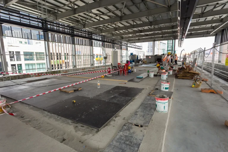Tiling installation works at Metro Prima MRT Station platform level in progress
