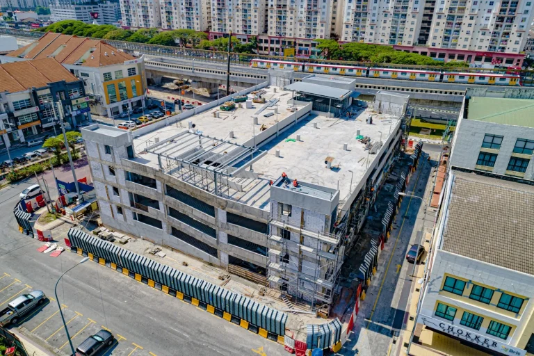 Aerial view of multi-storey park and ride for Metro Prima MRT Station showing the roof installation works in progress