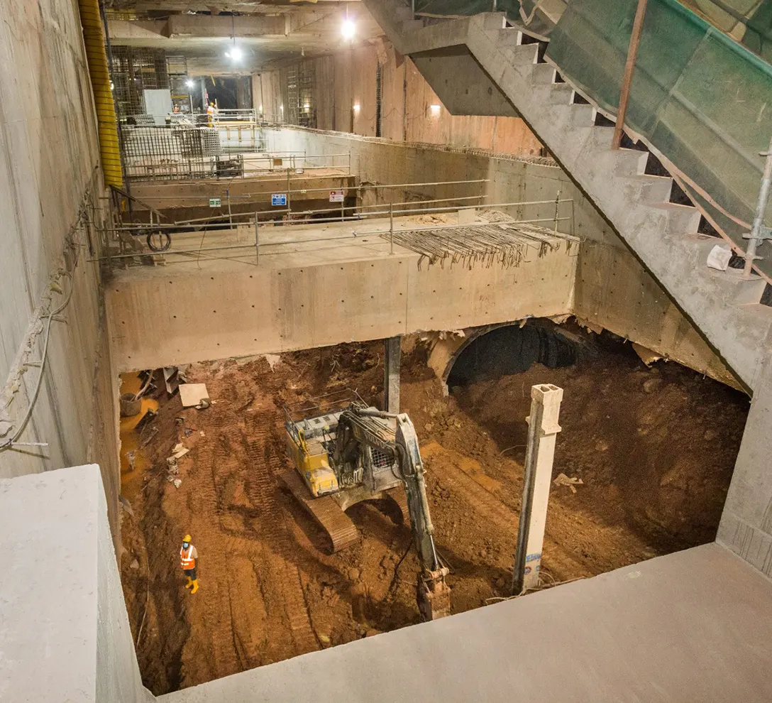Excavation of lower under platform level at the Persiaran KLCC MRT Station site.