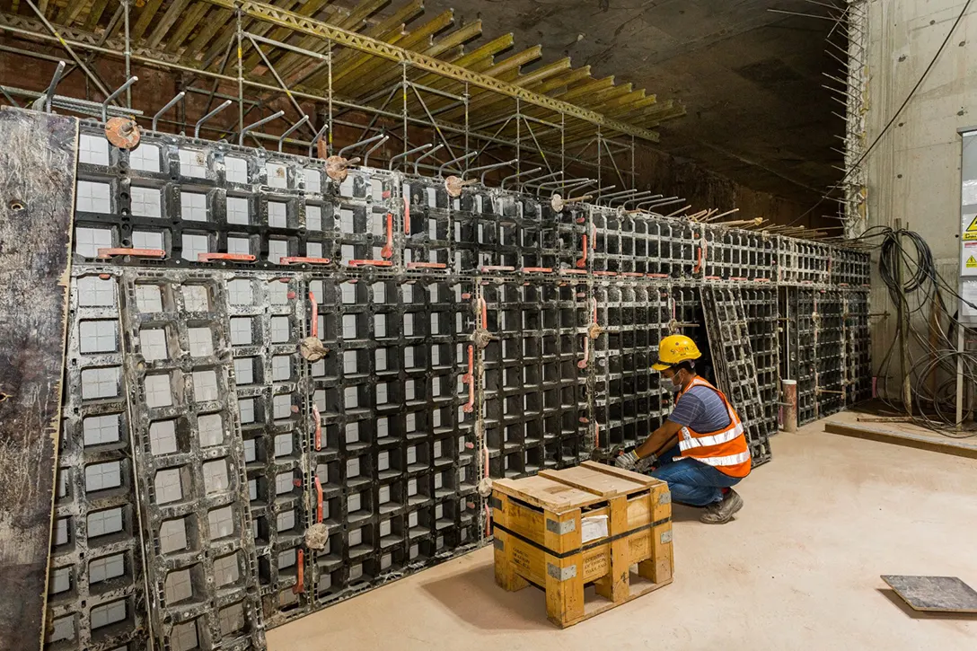 Formwork installation of upperplatform reinforced concrete wall at the Persiaran KLCC MRT Station site.