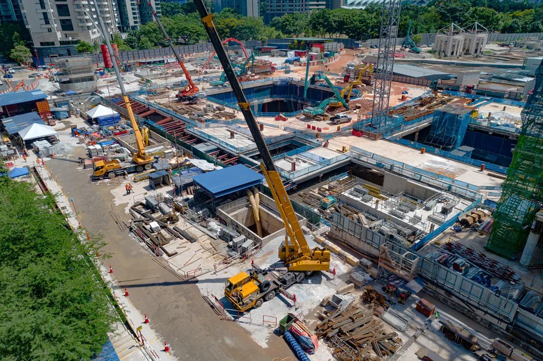 Aerial view of the Persiaran KLCC MRT Station construction site showing the few openings at the roof slab for delivery of materials to the underground station box