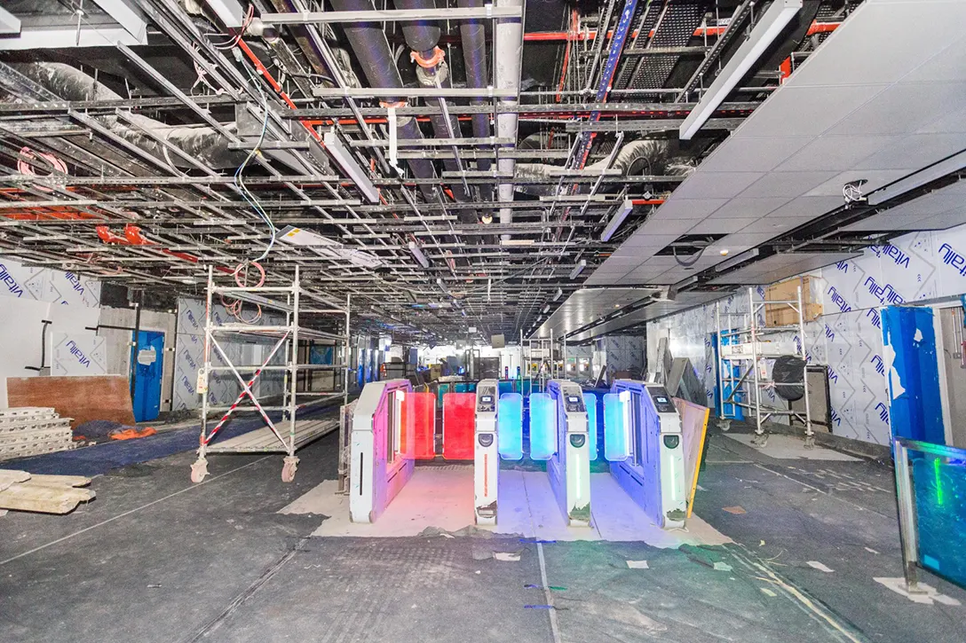 Installation of Automatic Fare Collection gate accessories at the Persiaran KLCC MRT Station concourse level