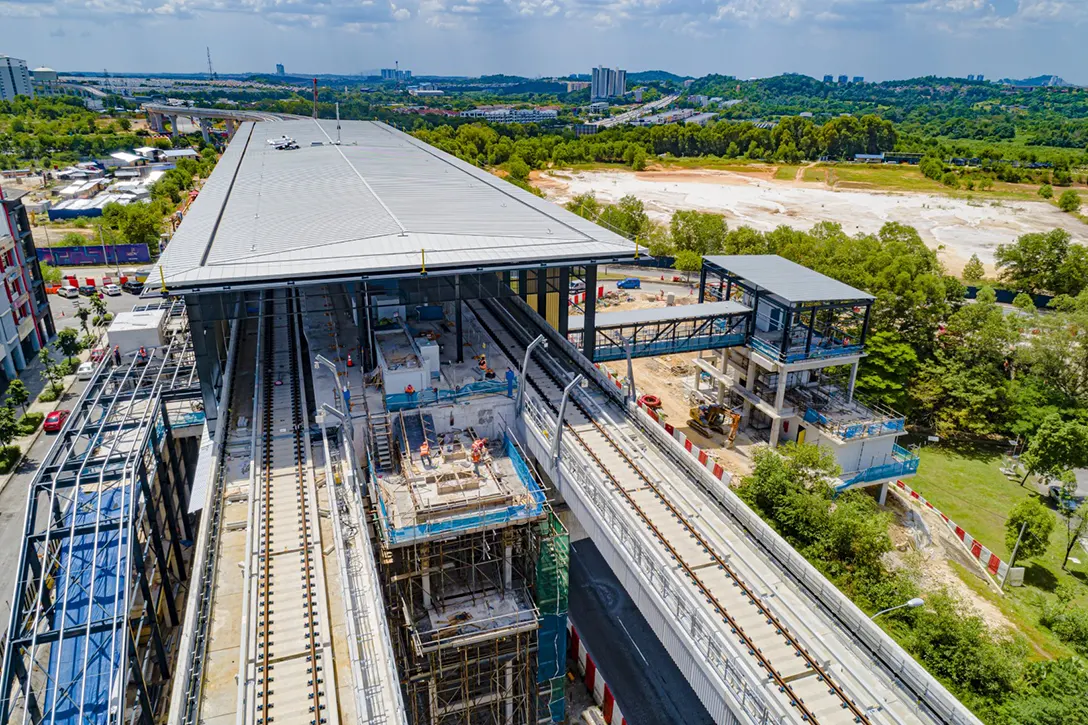 Aerial view of the Putra Permai MRT Station showing the architectural works in progress.