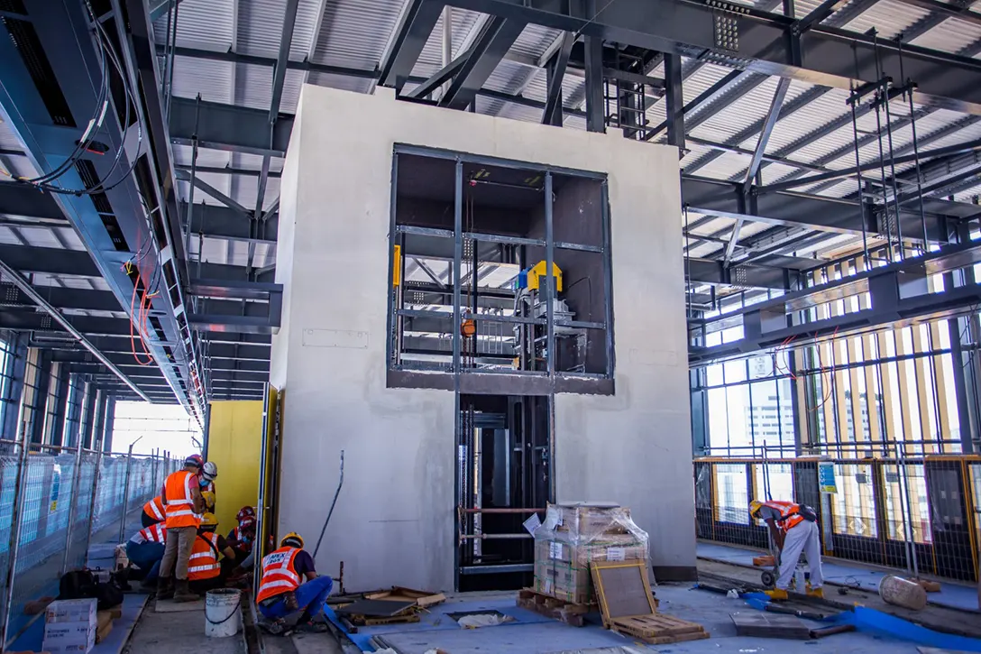 View inside the Putra Permai MRT Station showing the lift installation works in progress.