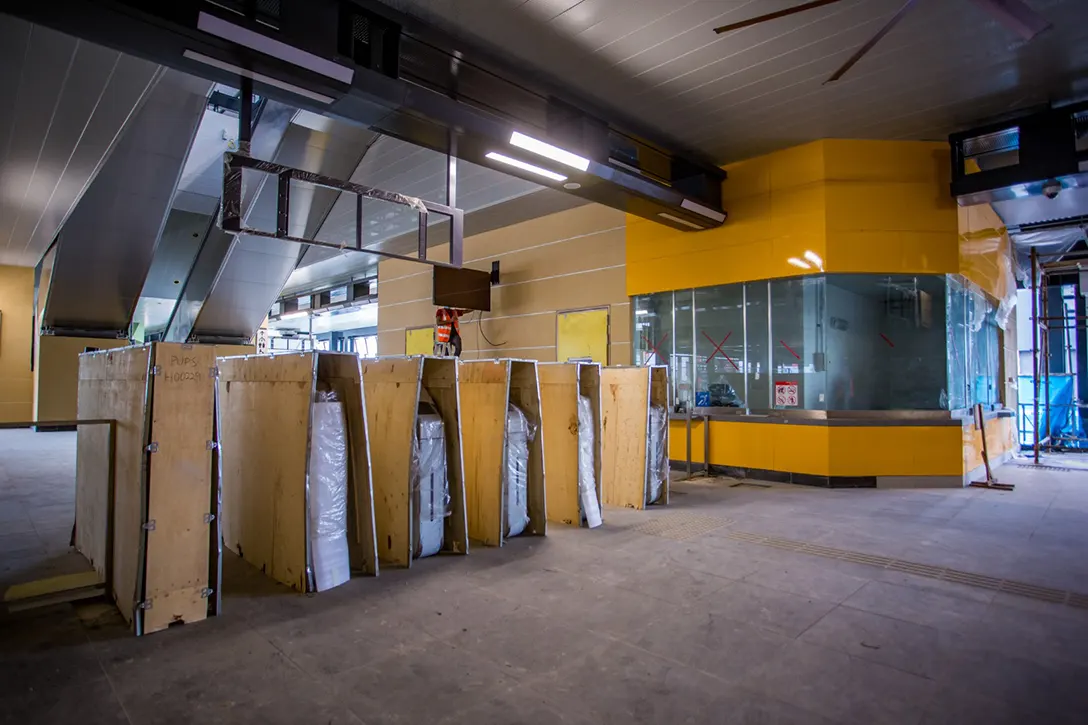 Final architectural finishing touches in progress at the Putra Permai MRT Station.