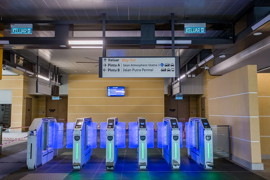 Testing and commissioning of Automatic Fare Collection gate system in progress at the Putra Permai MRT Station.