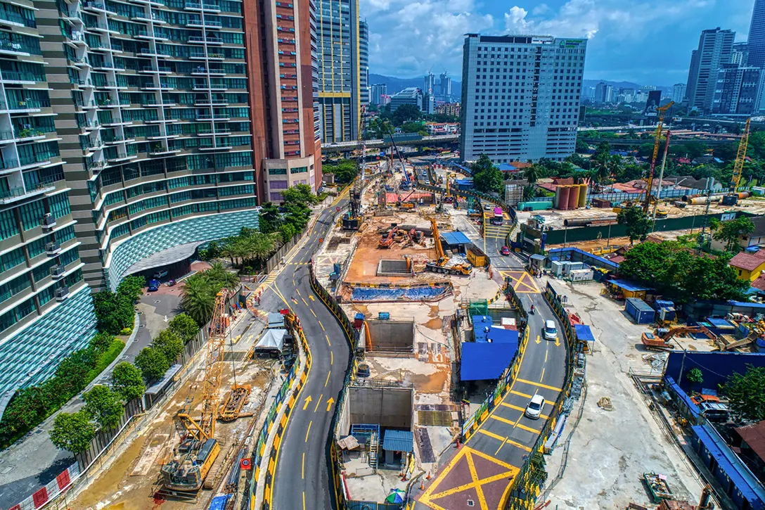 Overall view of rapid construction works in progress at the Raja Uda MRT Station, in front of Setia Sky Residence.