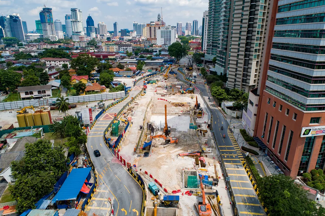 Aerial view of the Raja Uda MRT Station showing the current road diversion and excavation works in progress.