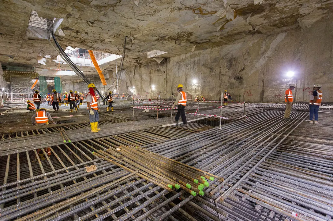 Final stages of reinforcement installation in preparation for base slab casting at the Raja Uda MRT Station.