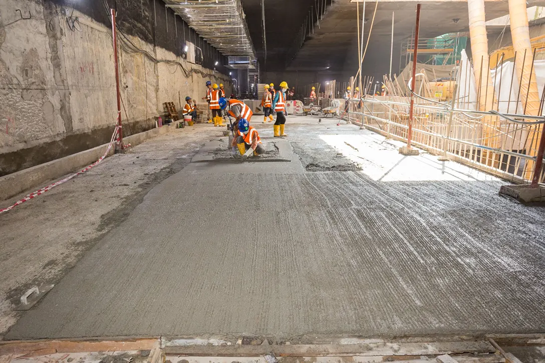 Screeding works in progress at the Front of House, the future access area of the public at the concourse level of the Raja Uda MRT Station.